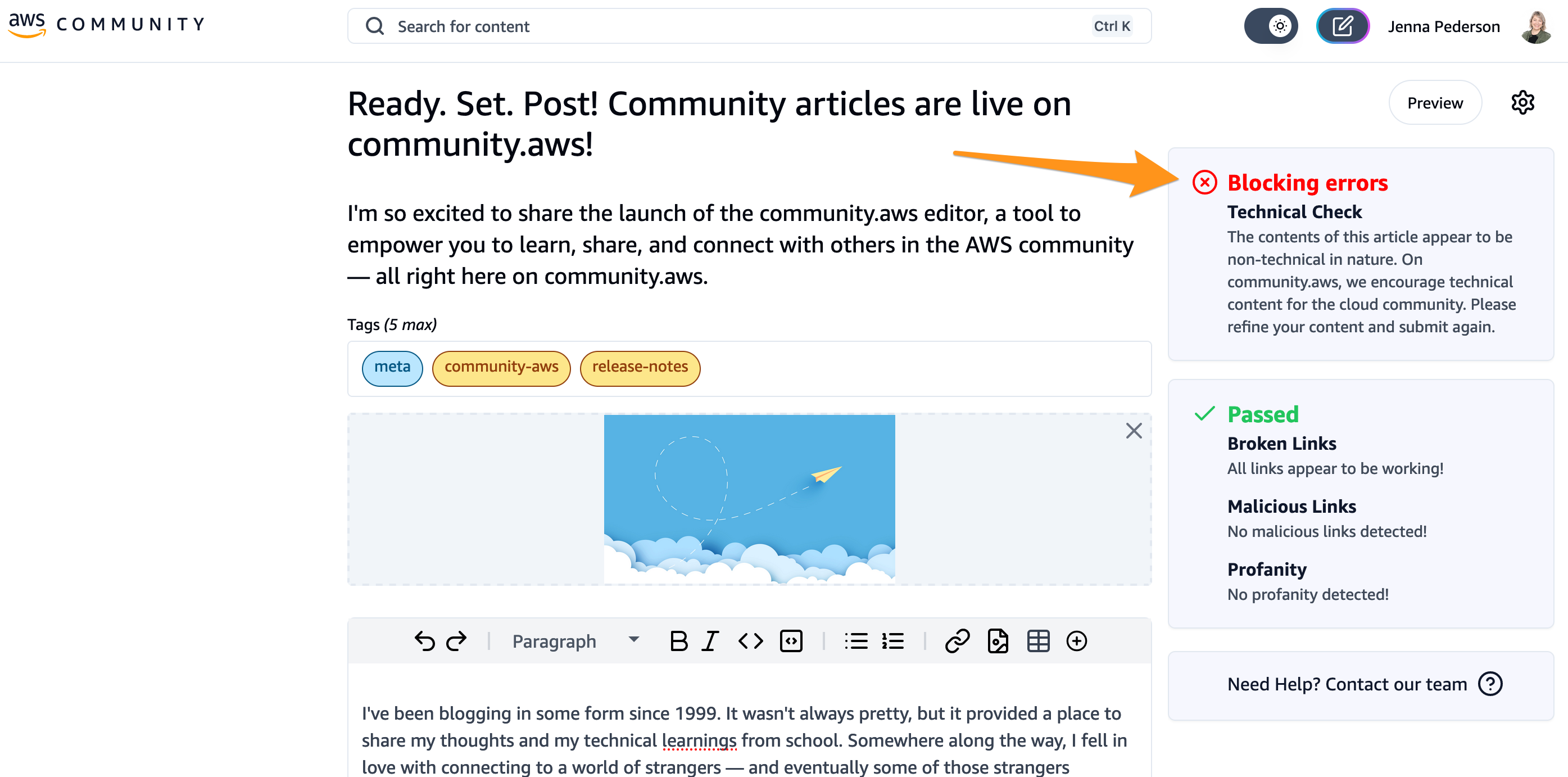 Edit page showing the results of the review. Shows orange arrow pointing to one blocking error.